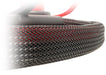 Close-up of a braided black cable with red inner strands visible through the weave, shown against a white background.